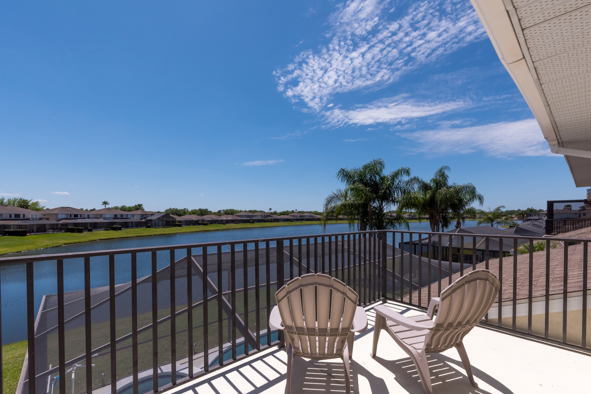 Lake view balcony at Mickeys Manor on Sunset Lakes in Florida
